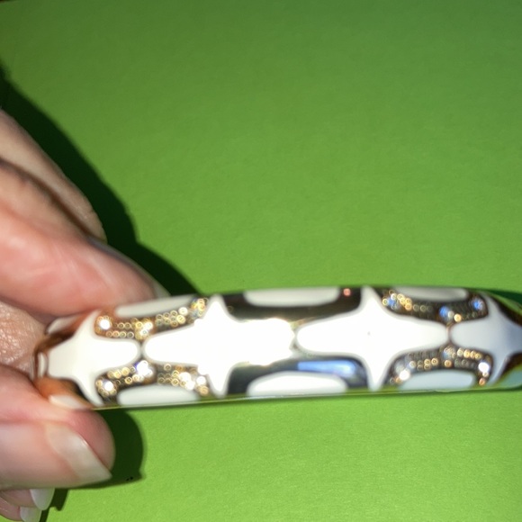NWOT hinged rd. bracelet w/white enamel between gold designs. $25 - Picture 6 of 6